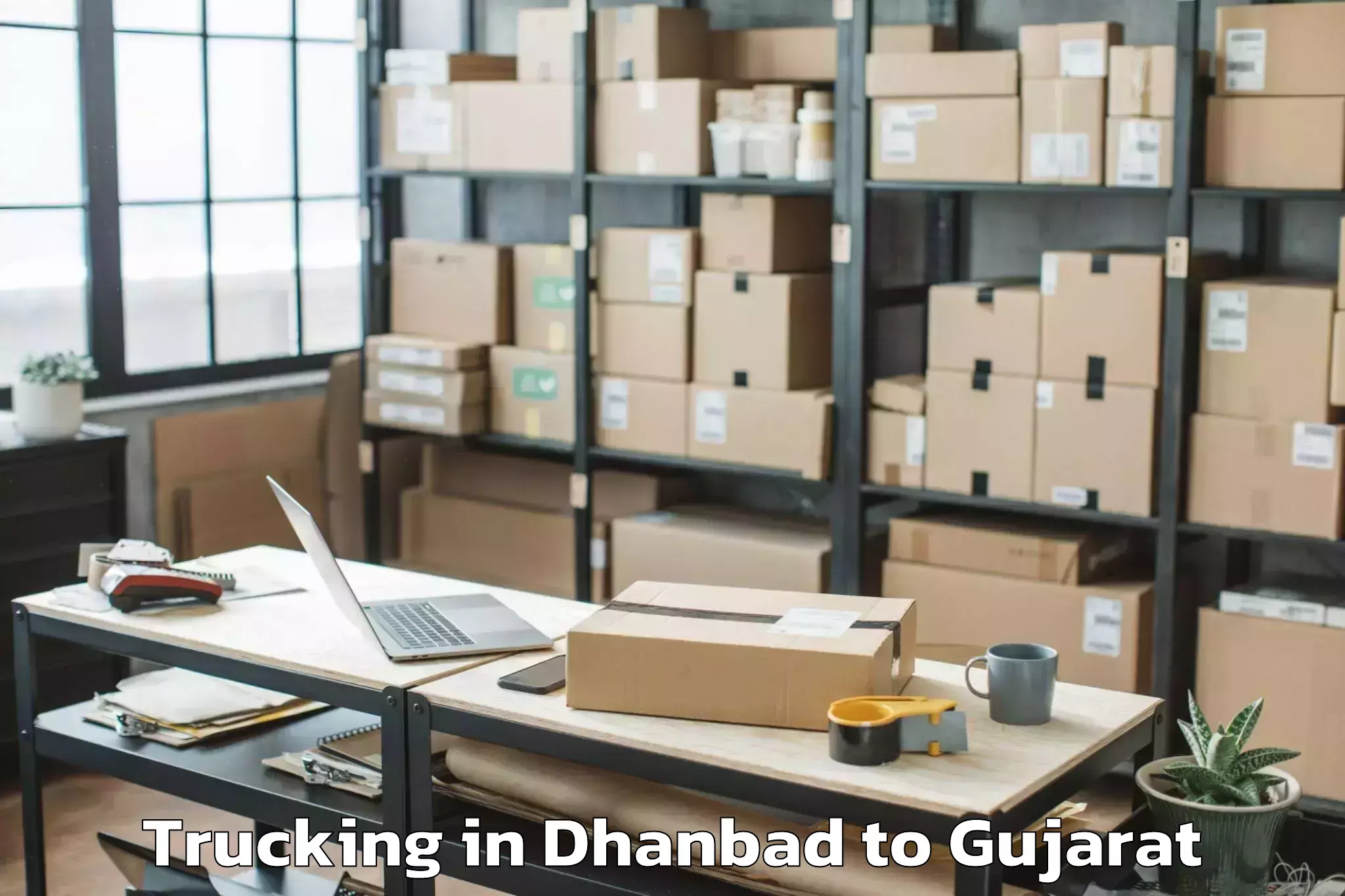 Easy Dhanbad to Shilaj Trucking Booking